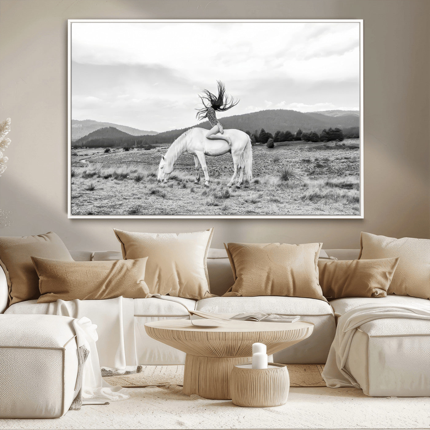 Black and white photo of a woman on a white horse in moody tones, ideal for Western Boho or modern rustic-style home decor.