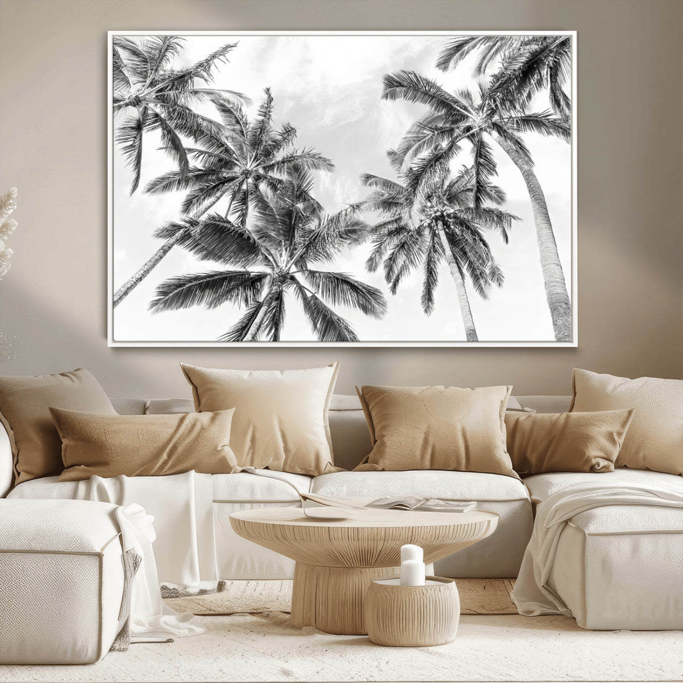 Black and white tropical palm trees viewed from below, swaying gently against a bright sky, creating a serene and elegant coastal atmosphere.