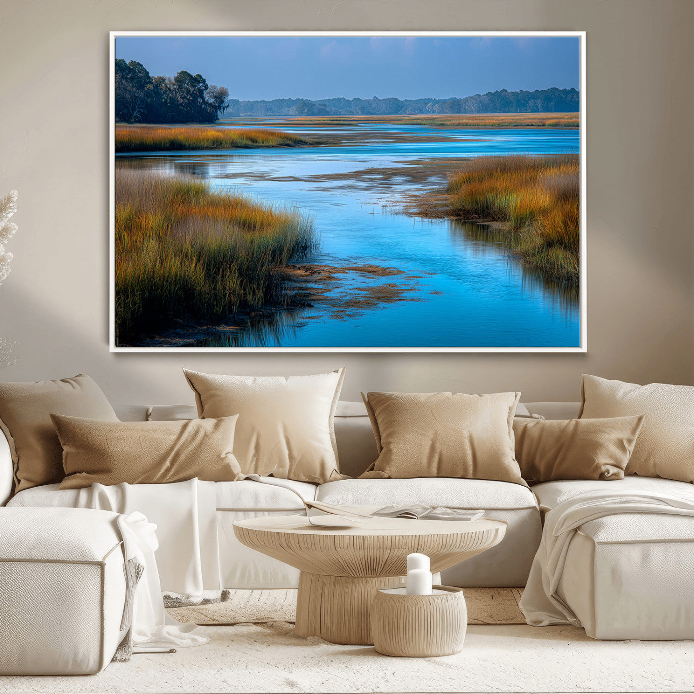 A peaceful marshland scene with calm blue water reflecting the surrounding grasses and trees, capturing the beauty of nature in a serene landscape.