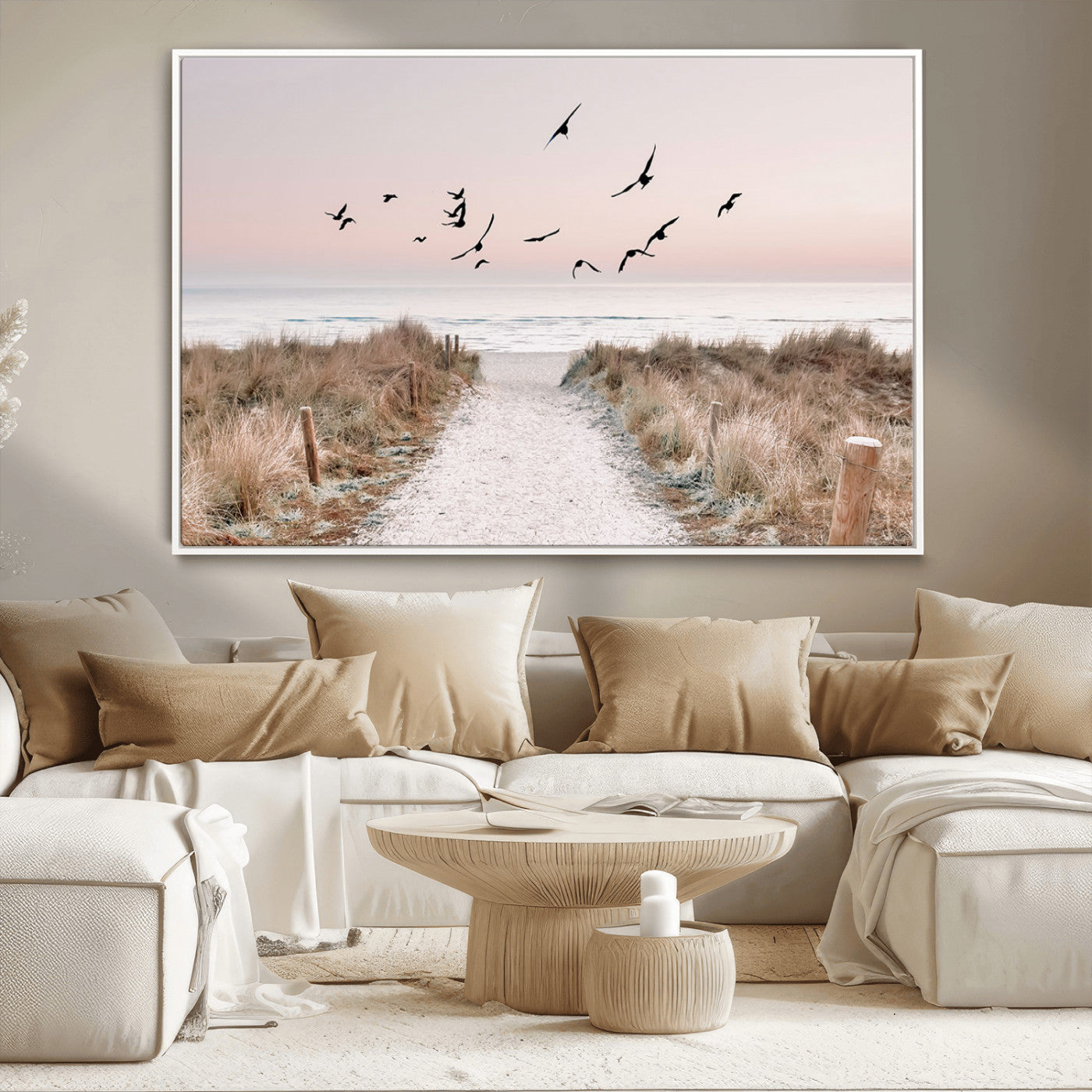 A peaceful coastal pathway leading to the ocean, with birds flying across a soft pastel sky, creating a calm and scenic beach atmosphere.