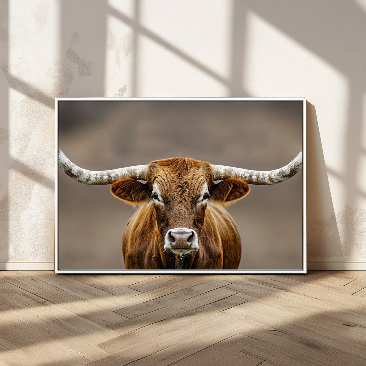 Close-up of a Texas Longhorn with strong curved horns and warm brown tones, perfect for rustic or western-style wall decor.