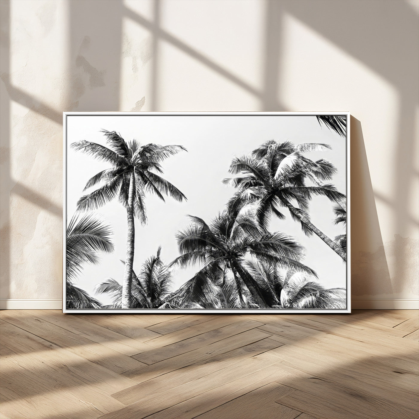 Black and white canvas of tall palm trees in moody tones, perfect for modern tropical minimalist or coastal-style home decor.