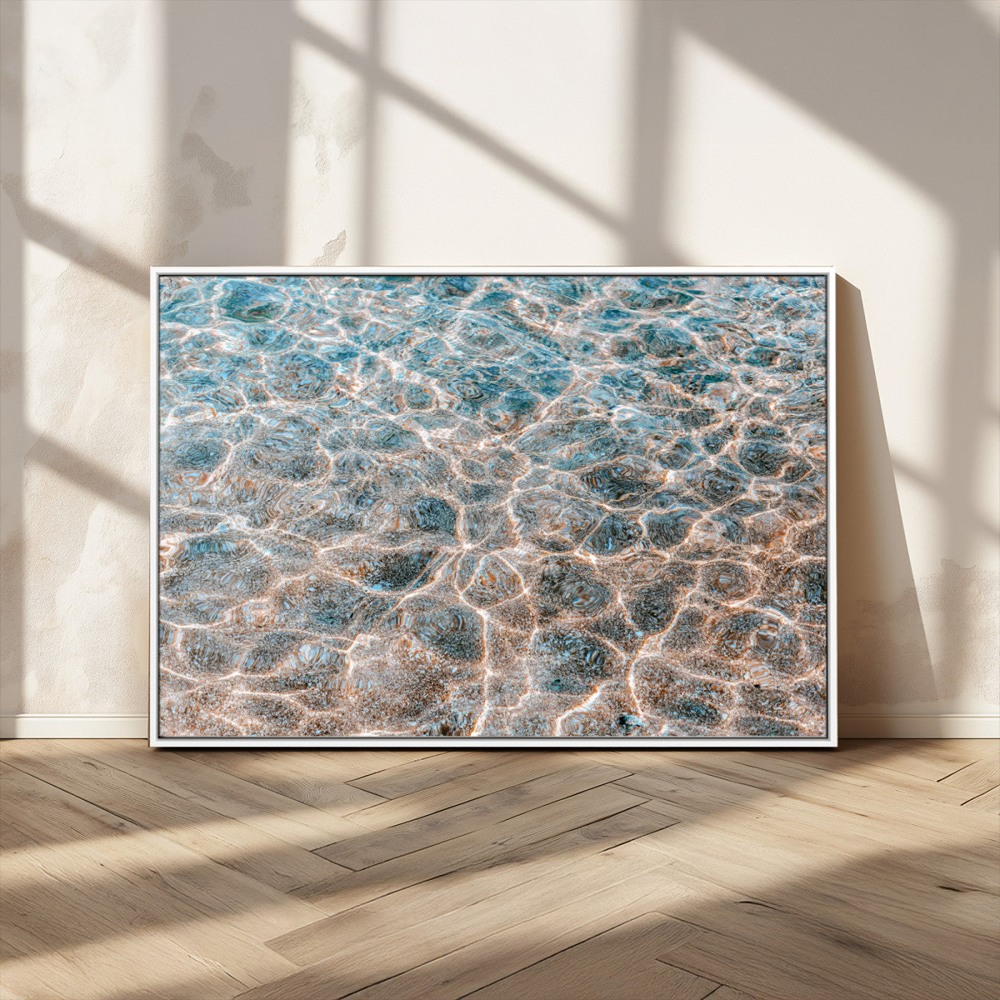 Close-up of sunlit ocean ripples with aqua blue and golden tones, ideal for modern coastal or minimalist home decor.