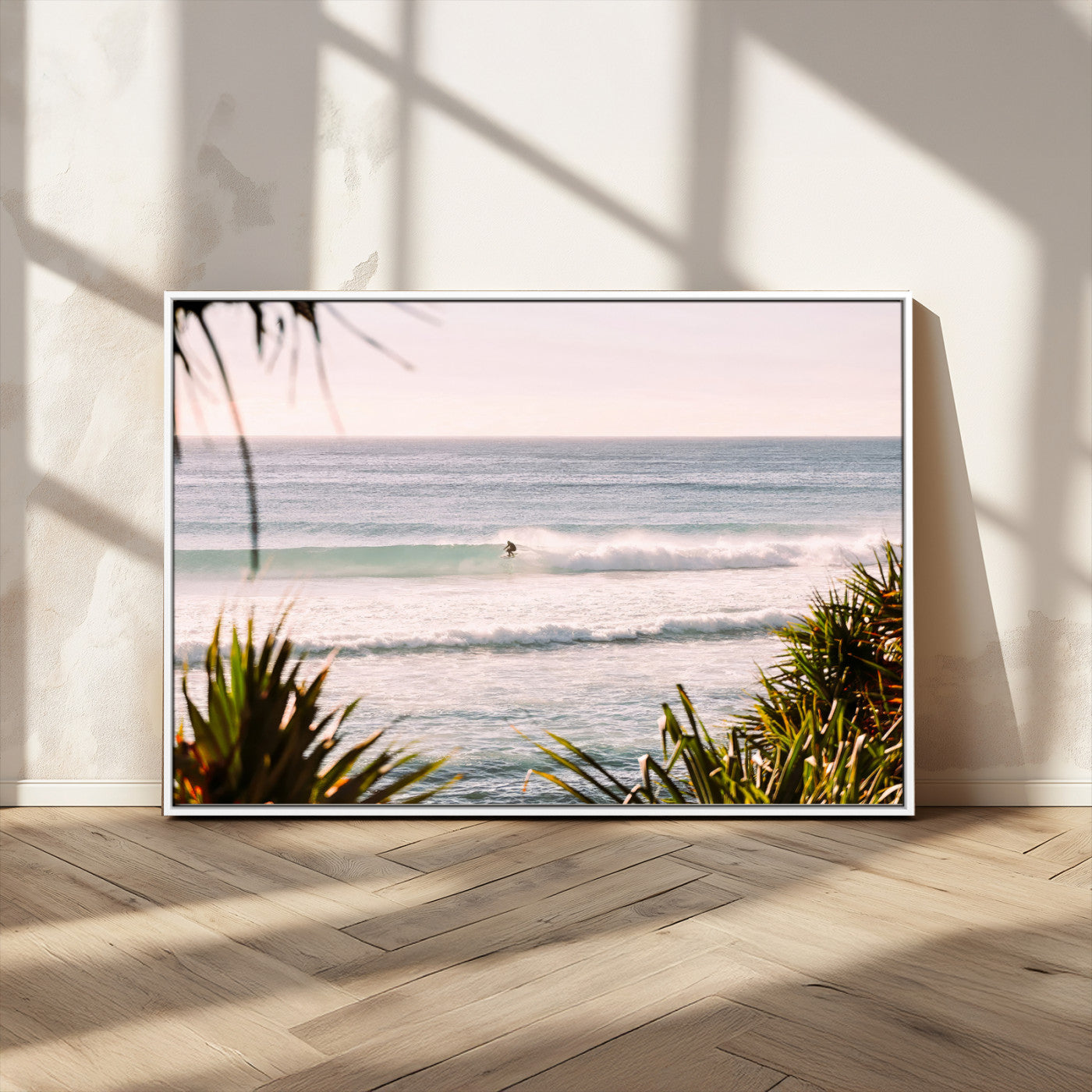 Canvas of a lone surfer riding a pastel wave at sunrise, perfect for tropical or coastal-themed spaces with a relaxed, airy vibe.