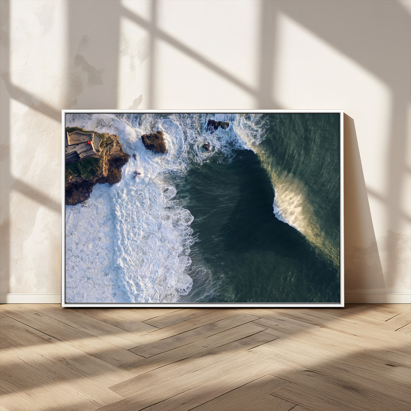 Canvas showing an aerial view of crashing waves along the Nazaré coastline, perfect for dramatic coastal or ocean-themed home decor.