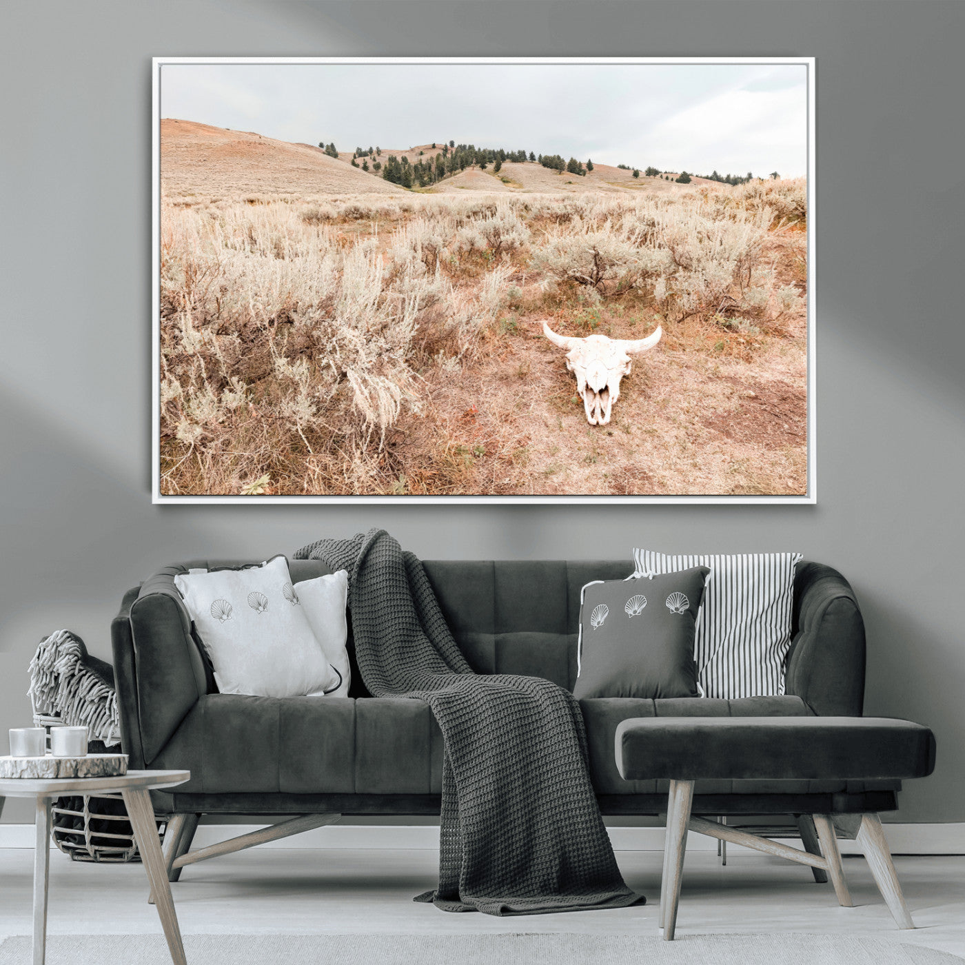 Rustic bull skull on dry sagebrush field under soft light, ideal for western minimal or desert prairie-style wall decoration.