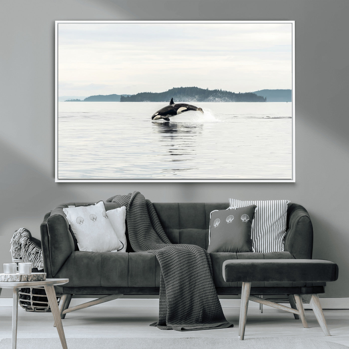 An orca jumping out of calm ocean waters with a misty island in the background, creating a serene and minimalist marine wildlife scene.
