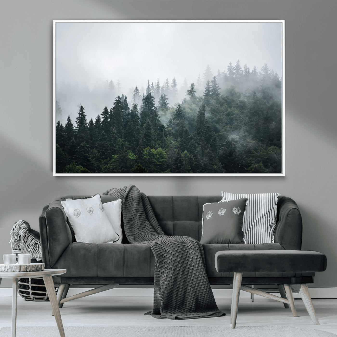 A misty evergreen forest shrouded in soft fog, creating a tranquil and moody landscape with lush green trees fading into the distance.