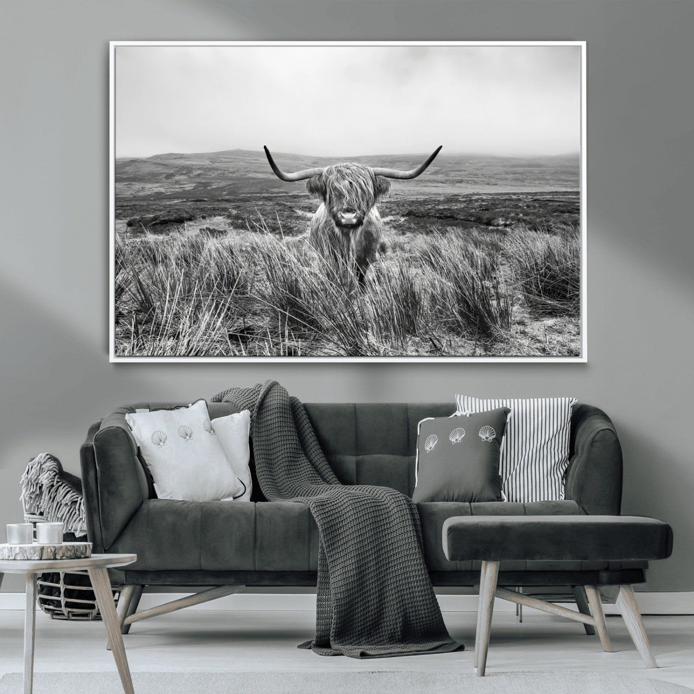 A black and white portrait of a Highland cow in a foggy Scottish countryside, capturing a rustic aesthetic and tranquil farm escape.
