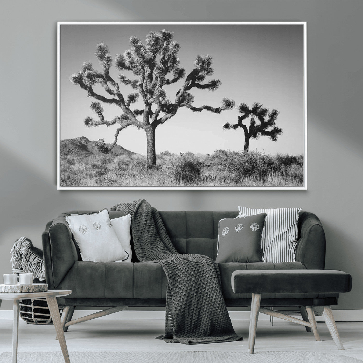 Black and white Joshua trees in a rugged desert landscape, creating a calm and minimalist feel for natural or rustic-themed interiors.