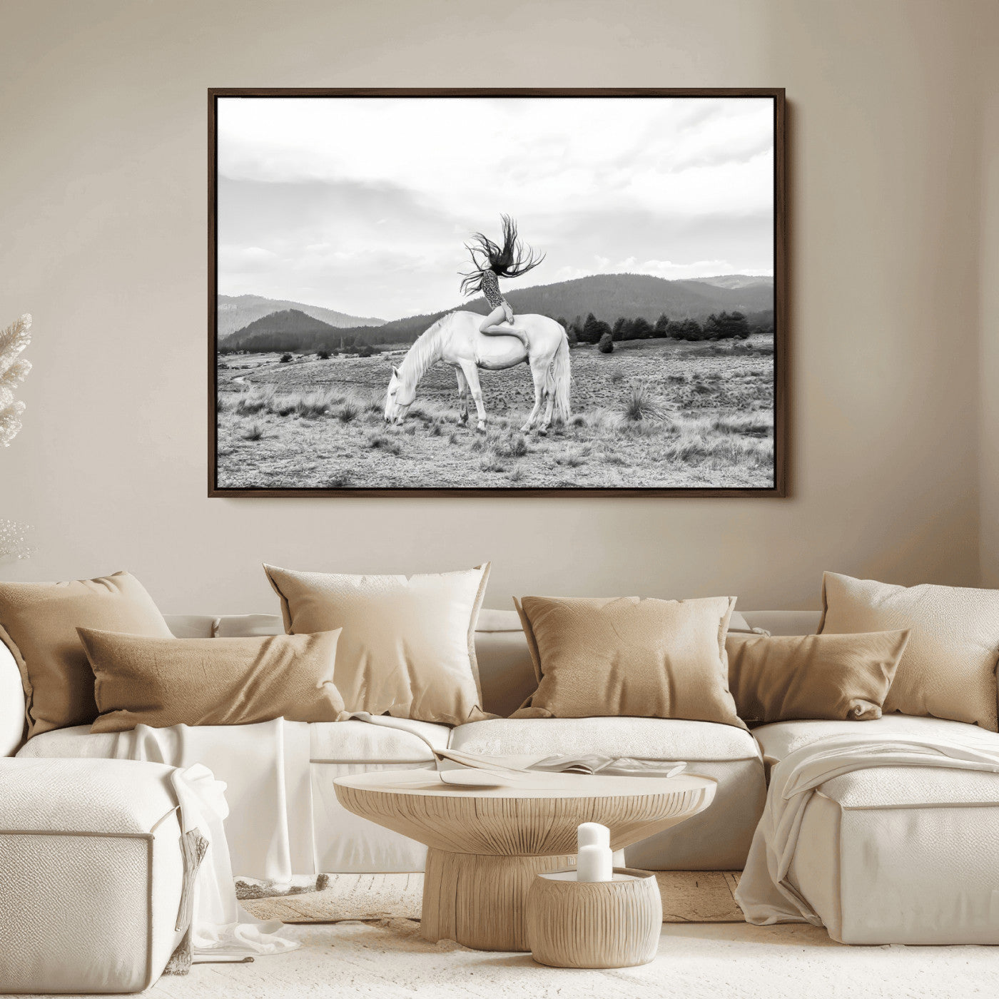 Black and white photo of a woman on a white horse in moody tones, ideal for Western Boho or modern rustic-style home decor.