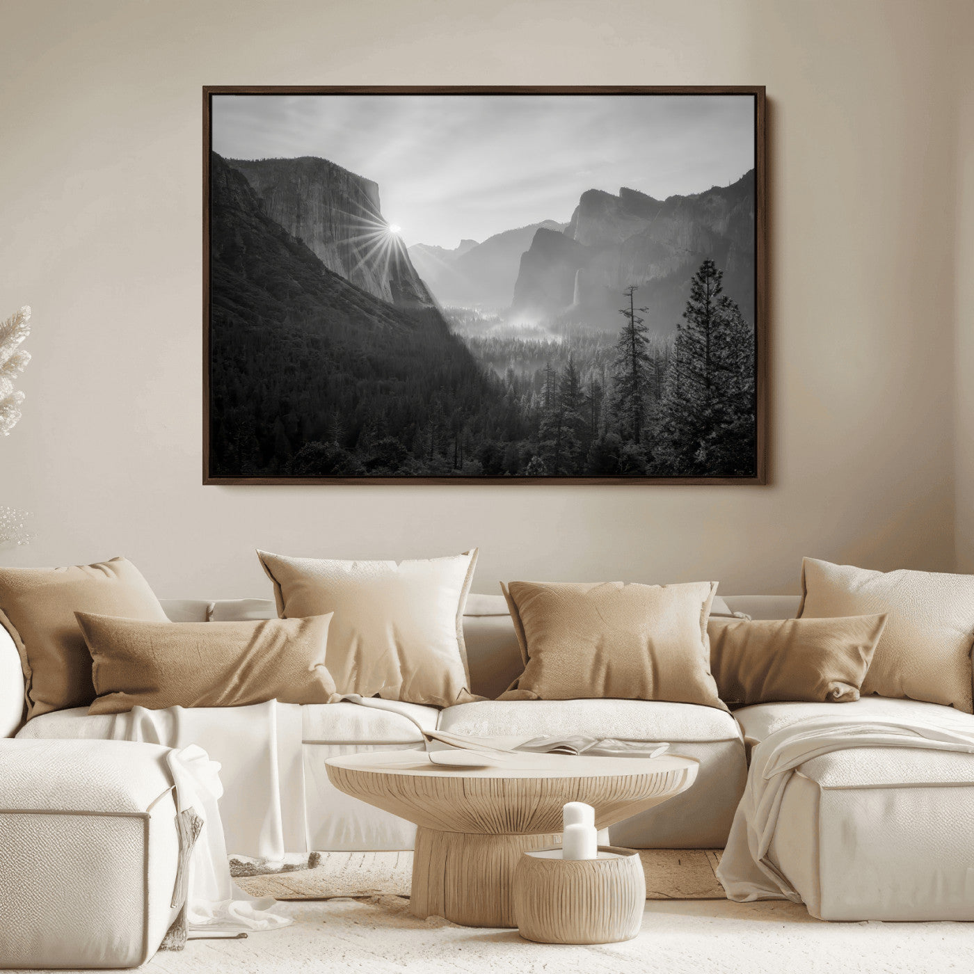 Black and white landscape of Yosemite with sun rays peeking over El Capitan, ideal for moody nature or modern rustic decor.
