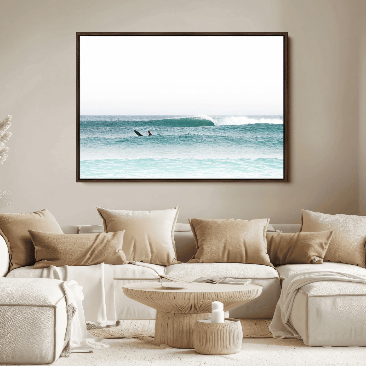 Minimalist photo of a lone surfer on calm aqua waves under bright sky, perfect for Scandinavian coastal or serene ocean-inspired home decor.