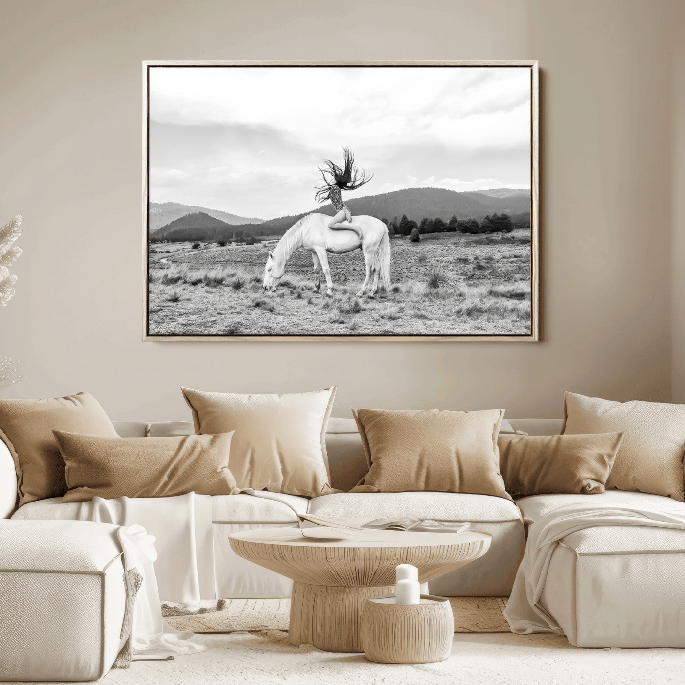 Black and white photo of a woman on a white horse in moody tones, ideal for Western Boho or modern rustic-style home decor.