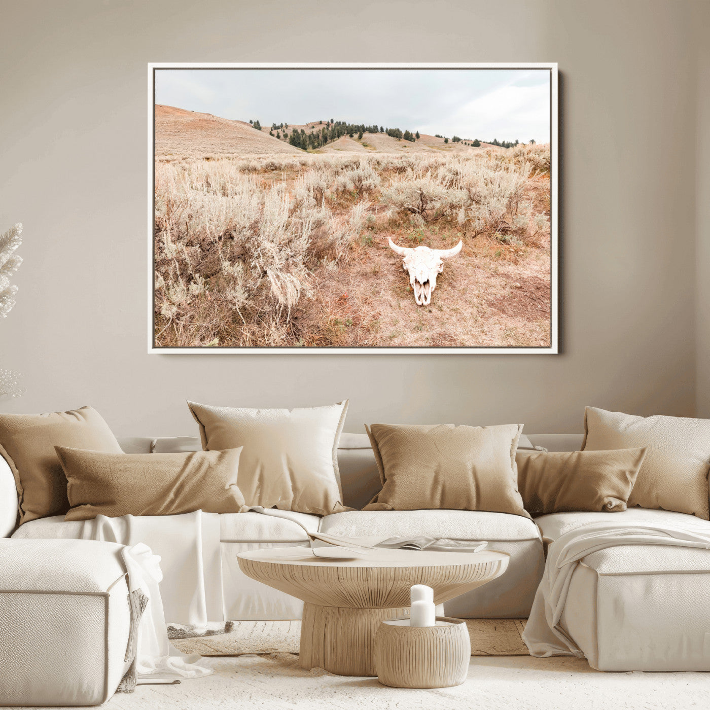 Rustic bull skull on dry sagebrush field under soft light, ideal for western minimal or desert prairie-style wall decoration.