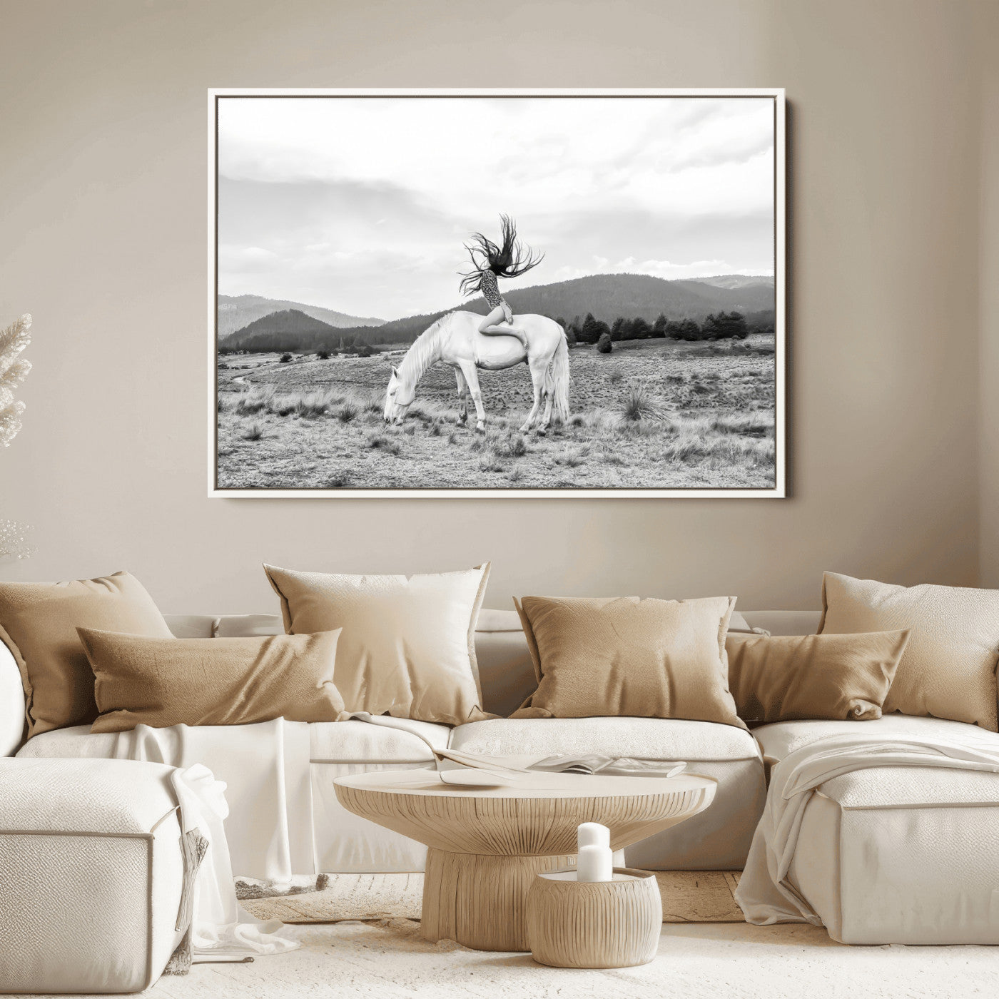 Black and white photo of a woman on a white horse in moody tones, ideal for Western Boho or modern rustic-style home decor.