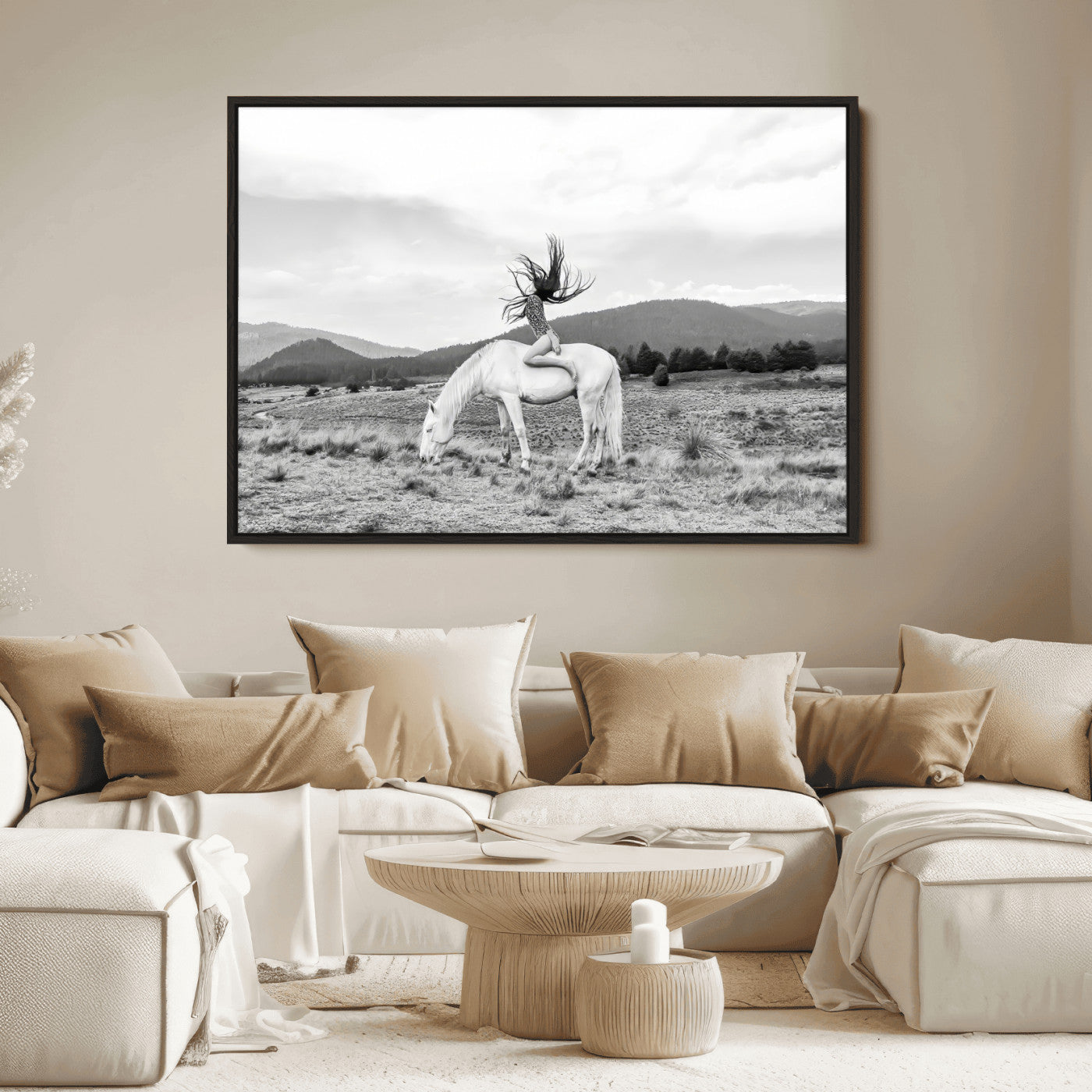 Black and white photo of a woman on a white horse in moody tones, ideal for Western Boho or modern rustic-style home decor.