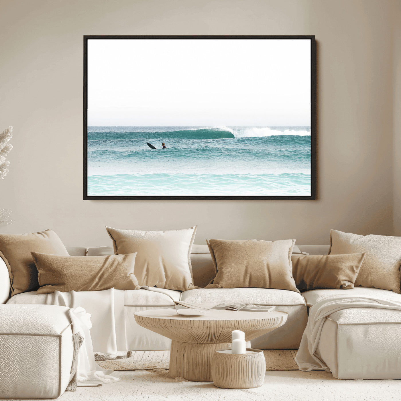 Minimalist photo of a lone surfer on calm aqua waves under bright sky, perfect for Scandinavian coastal or serene ocean-inspired home decor.