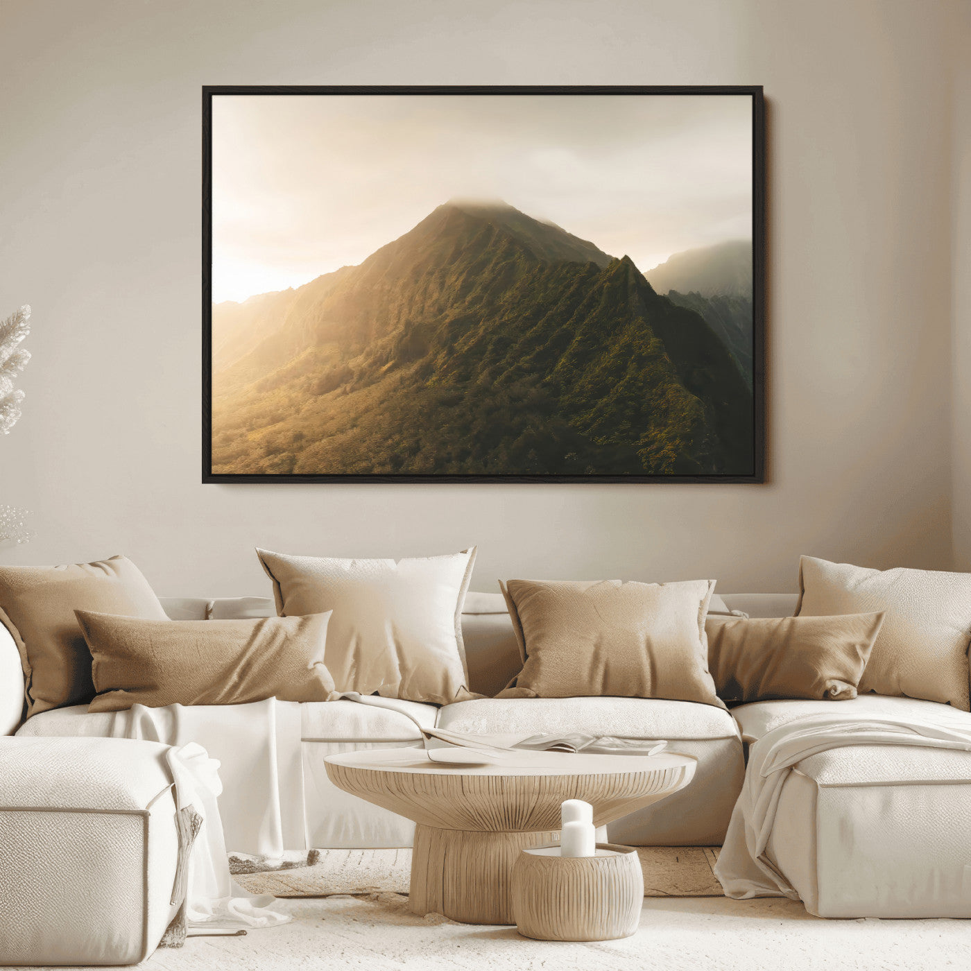 Sunlit mountain peak with mist rolling over its rugged slopes, bathed in golden light, creating a warm and tranquil nature-inspired scene.