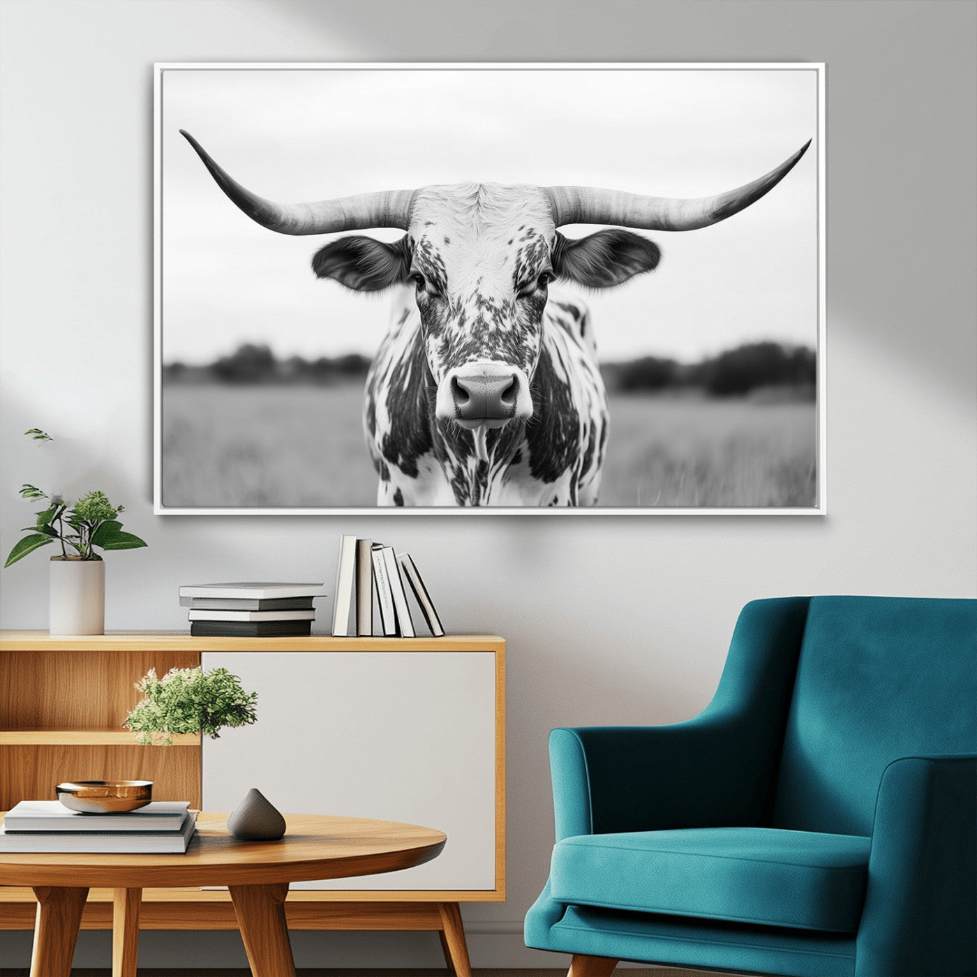 Capture the strength and elegance of nature with this striking black and white portrait of a longhorn cow. Its powerful presence makes a bold statement in any room.