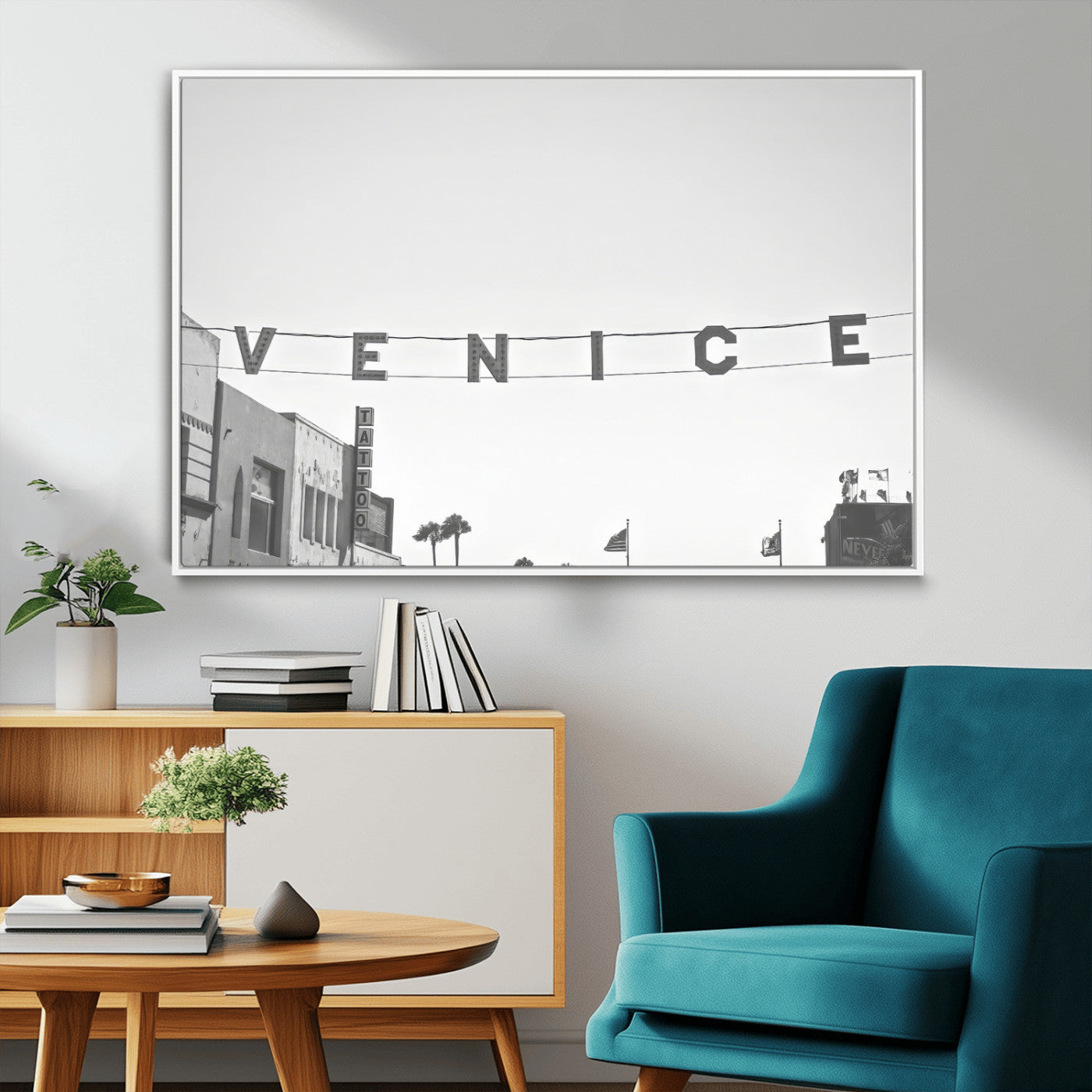 Black and white photo of Venice Beach sign and palm-lined street, perfect for urban coastal or minimalist LA-inspired wall decoration.