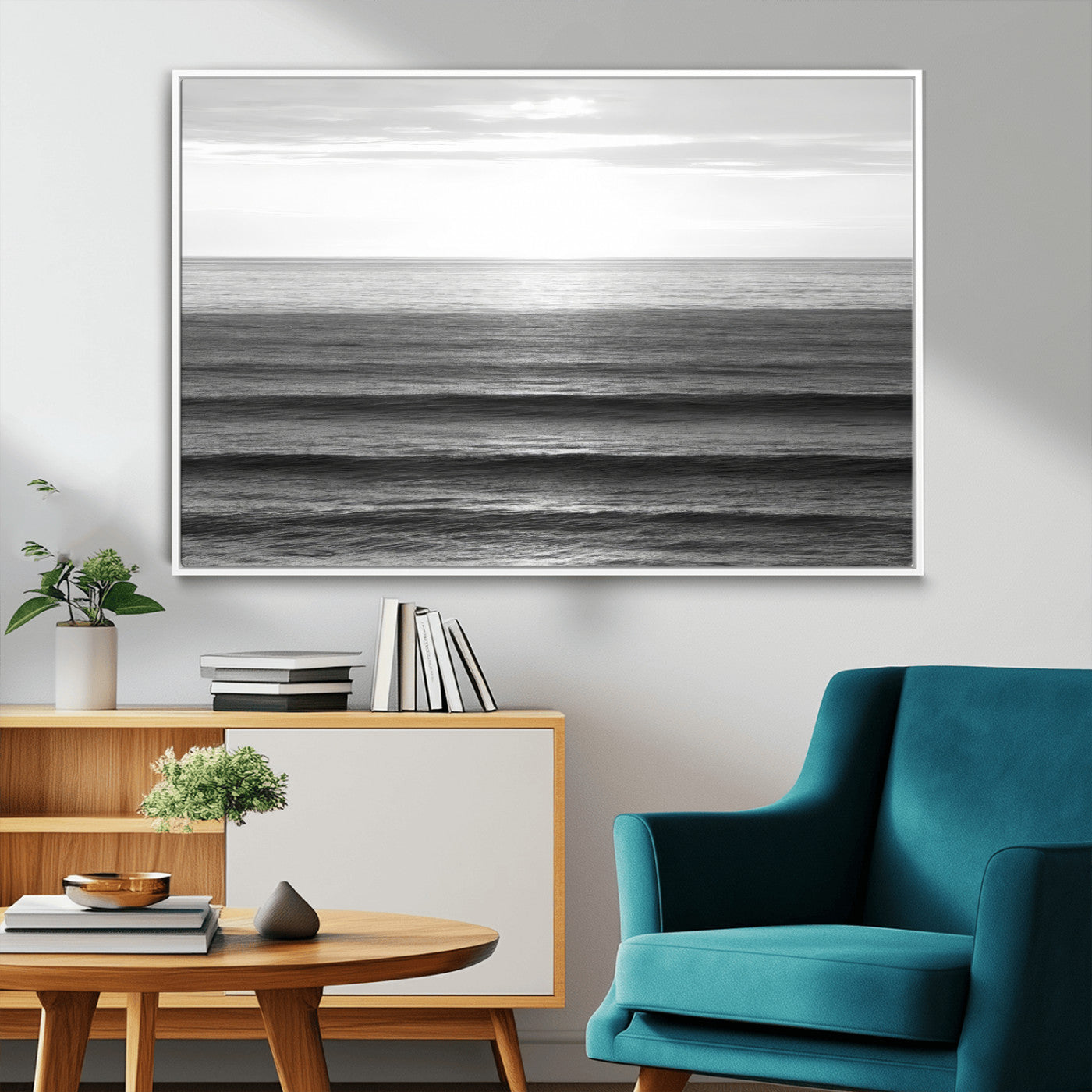 Minimalist black and white ocean view with layered waves reflecting sunlight, evoking a sense of calm and coastal serenity.