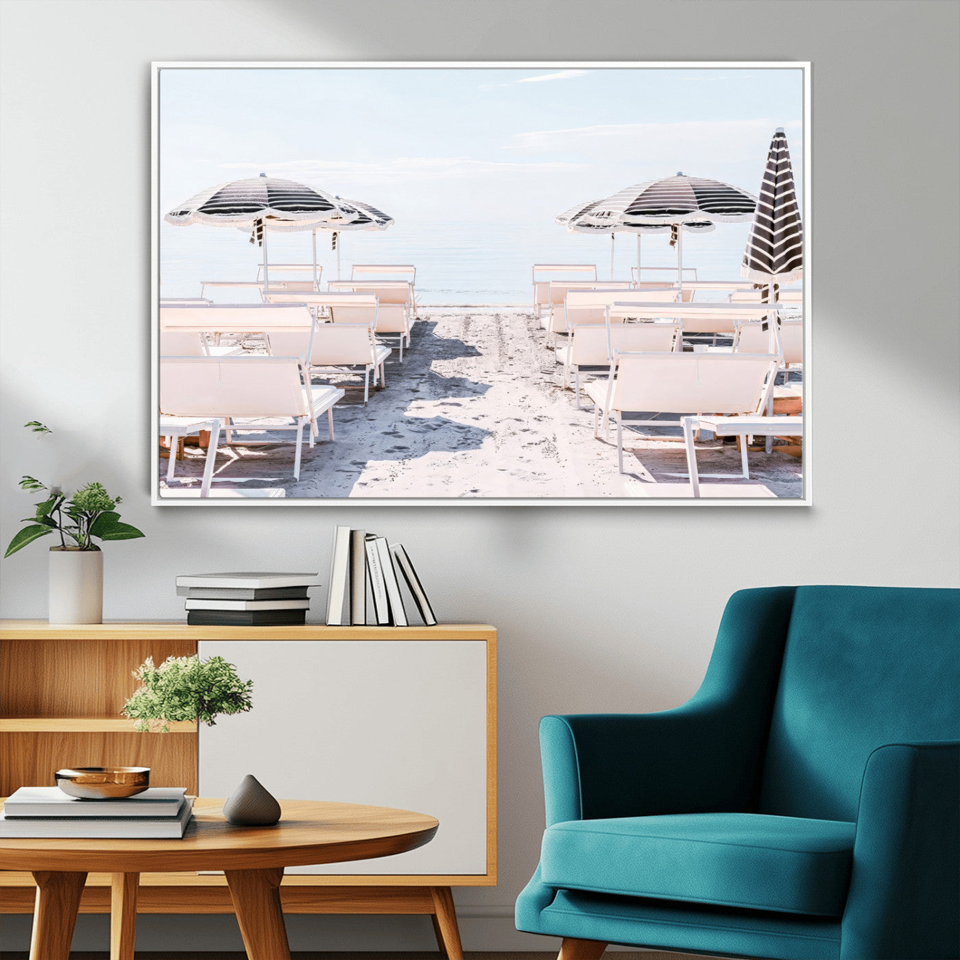 A serene minimalist beach scene featuring striped umbrellas, soft pastel sand, and an elegant lounge setup, creating a tranquil and stylish coastal retreat.