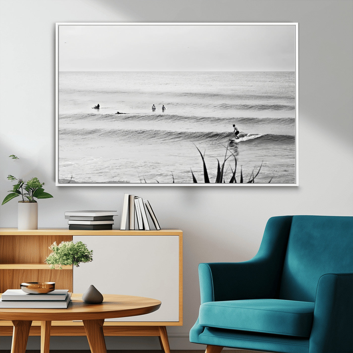Monochrome canvas of surfers on calm ocean waves, ideal for minimalist coastal or beach-inspired interior decor.