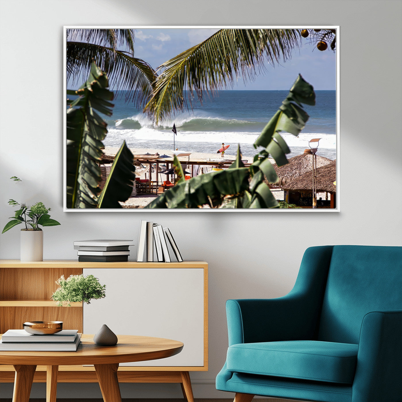 Canvas wall art of a tropical surf scene framed by palm trees, with a surfer on the shore and waves rolling in, ideal for beach-themed decor.