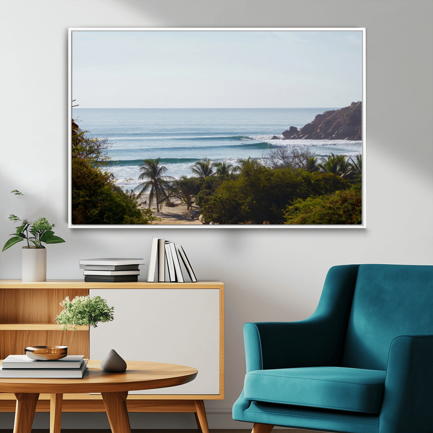 View of calm ocean waves with palm trees and a tropical coastline, ideal for coastal boho or beach-themed wall decor.