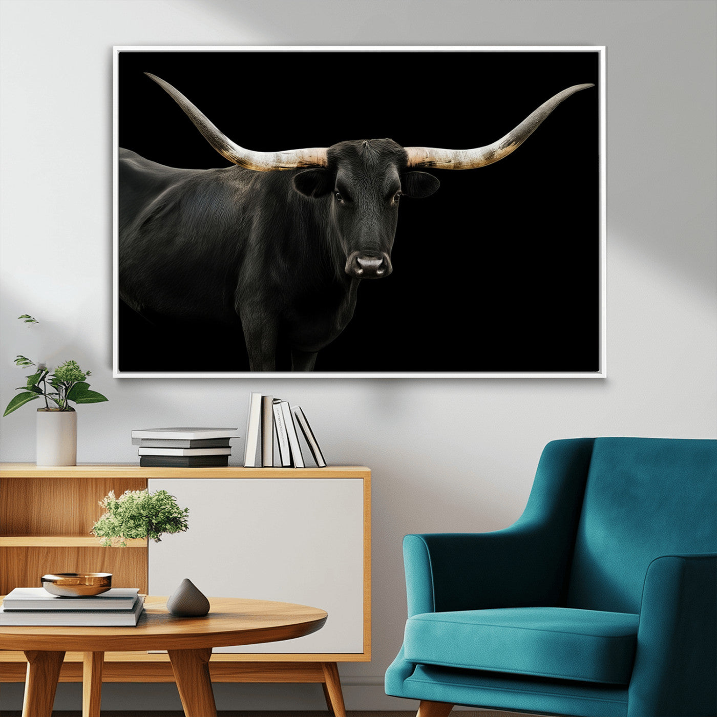 Close-up of a black Texas longhorn with large curved horns on black background, ideal for rustic farmhouse or modern western interiors.