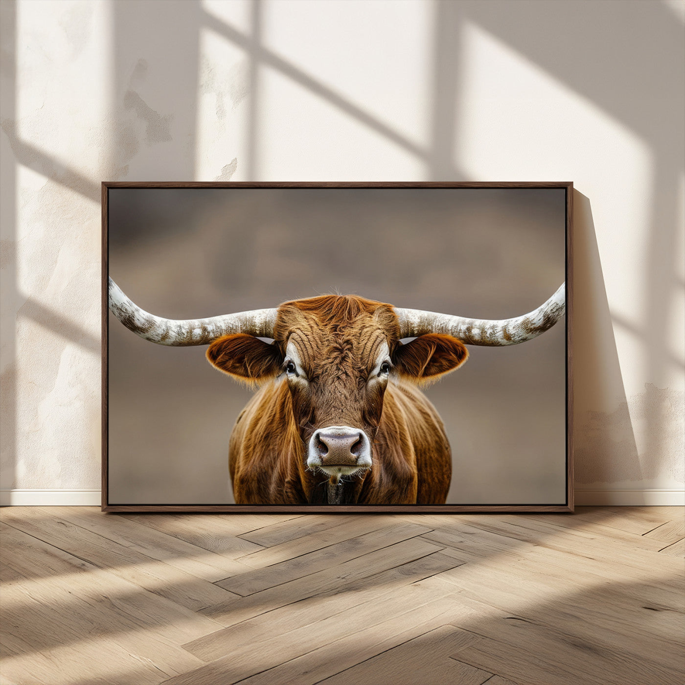 Close-up of a Texas Longhorn with strong curved horns and warm brown tones, perfect for rustic or western-style wall decor.