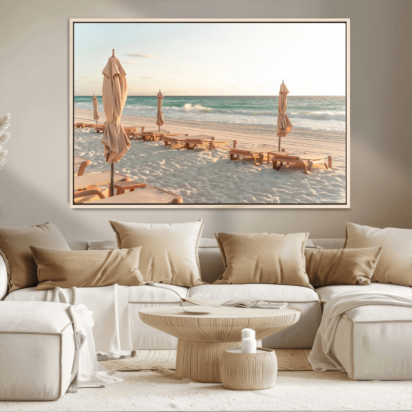 Minimalist photo of empty beach loungers and umbrellas on soft sand, ideal for calm seaside or pastel coastal-style home decor.