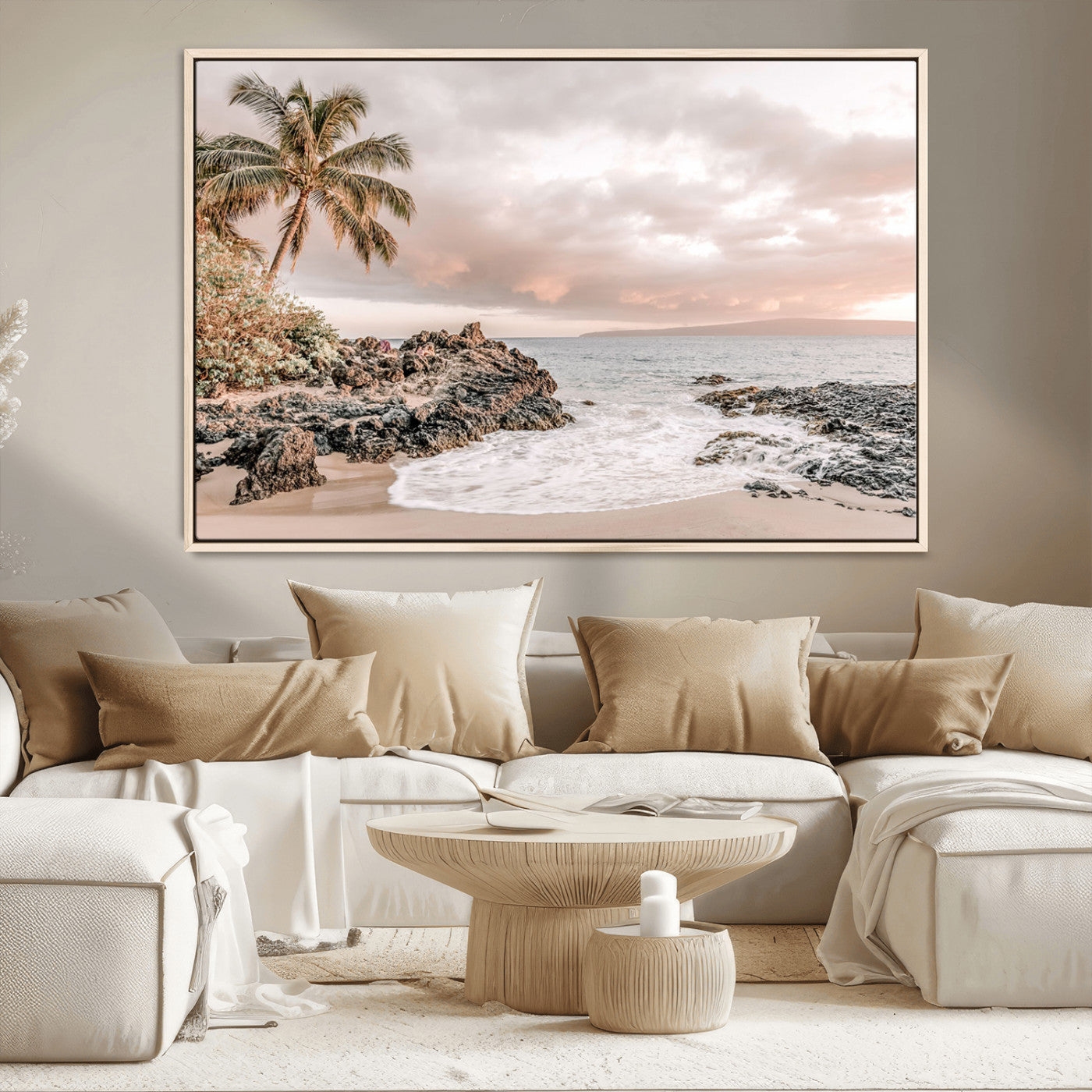 A peaceful beach scene with a palm tree and rocks, soft waves washing onto the shore under a soft pastel sky at sunset.