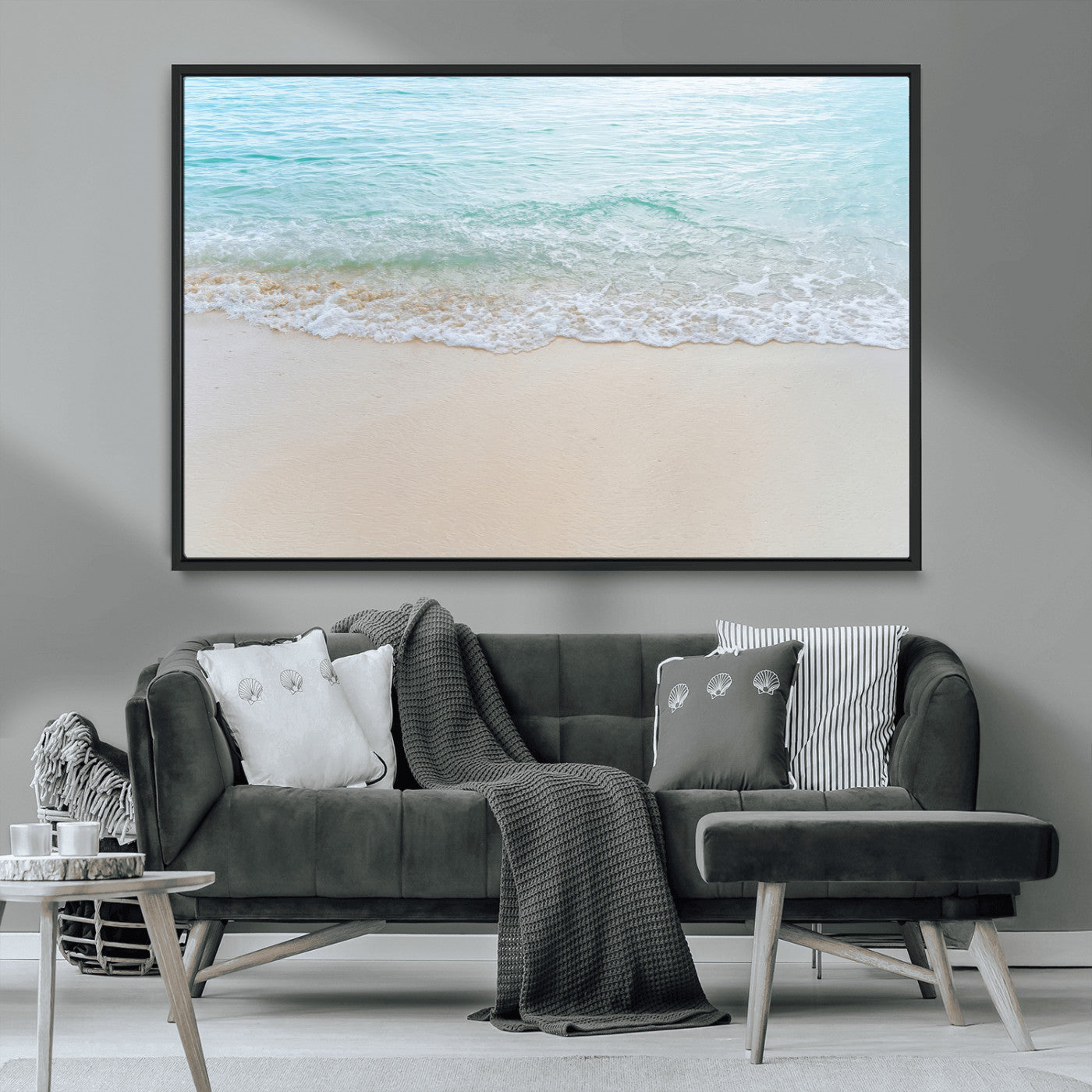 Soft shoreline with gentle aqua waves on smooth sand, ideal for minimalist coastal or pastel ocean-inspired home wall decor.
