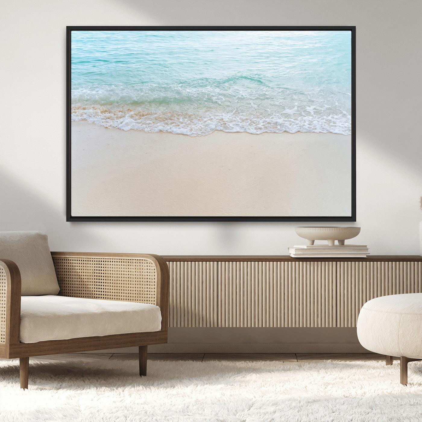 Soft shoreline with gentle aqua waves on smooth sand, ideal for minimalist coastal or pastel ocean-inspired home wall decor.