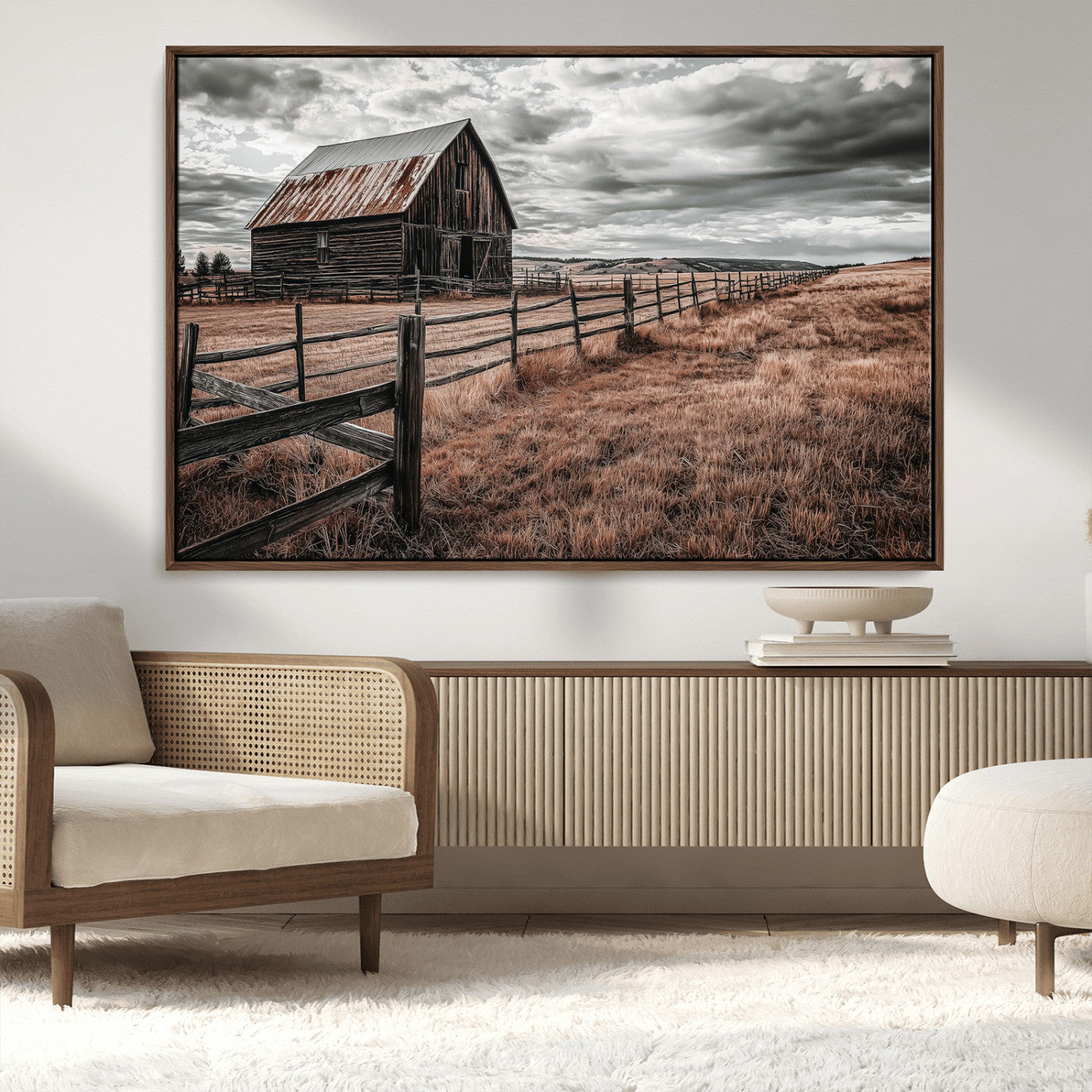 Framed canvas of a rustic barn under a moody sky with weathered fence and dark fields, ideal for farmhouse or rural-style wall decor.