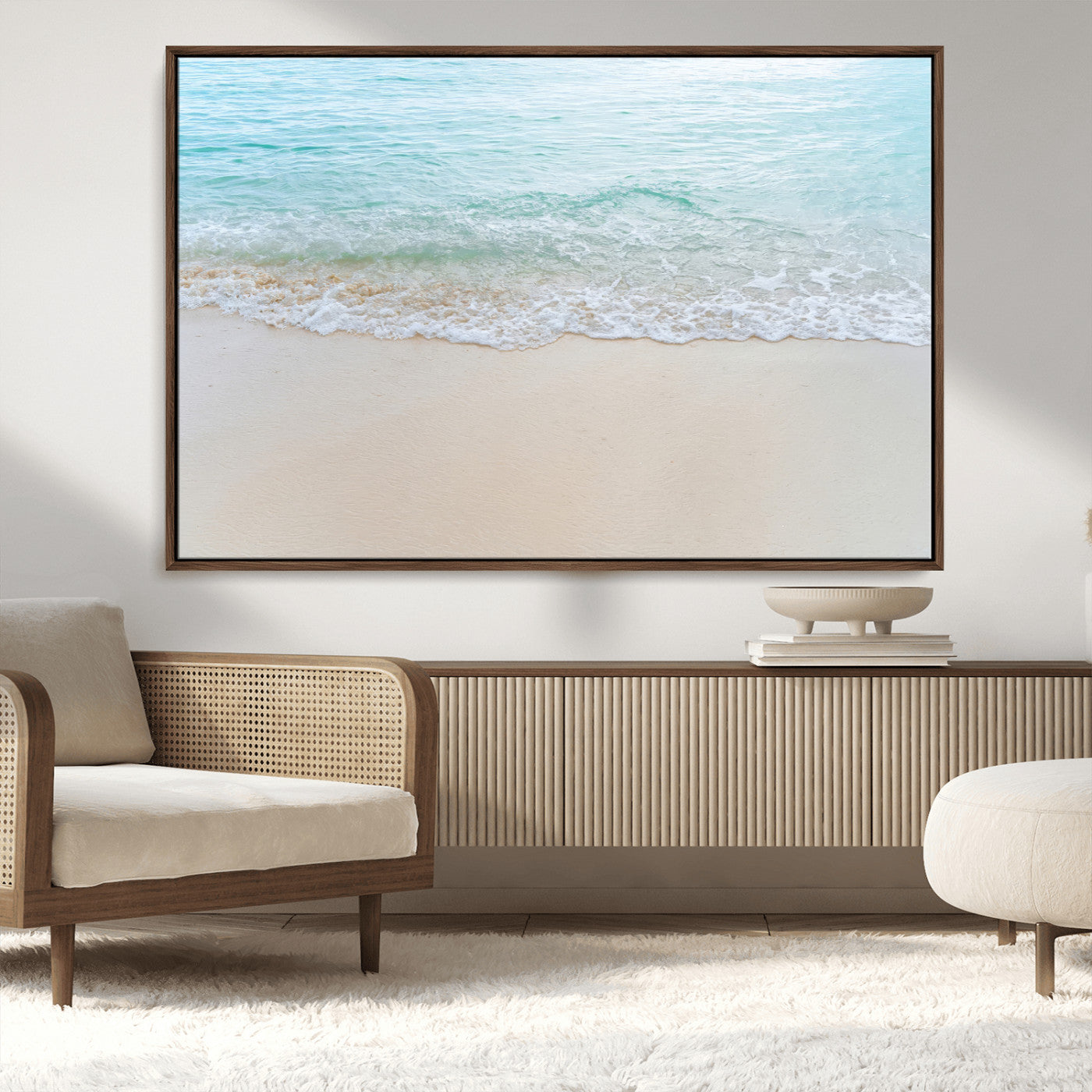 Soft shoreline with gentle aqua waves on smooth sand, ideal for minimalist coastal or pastel ocean-inspired home wall decor.