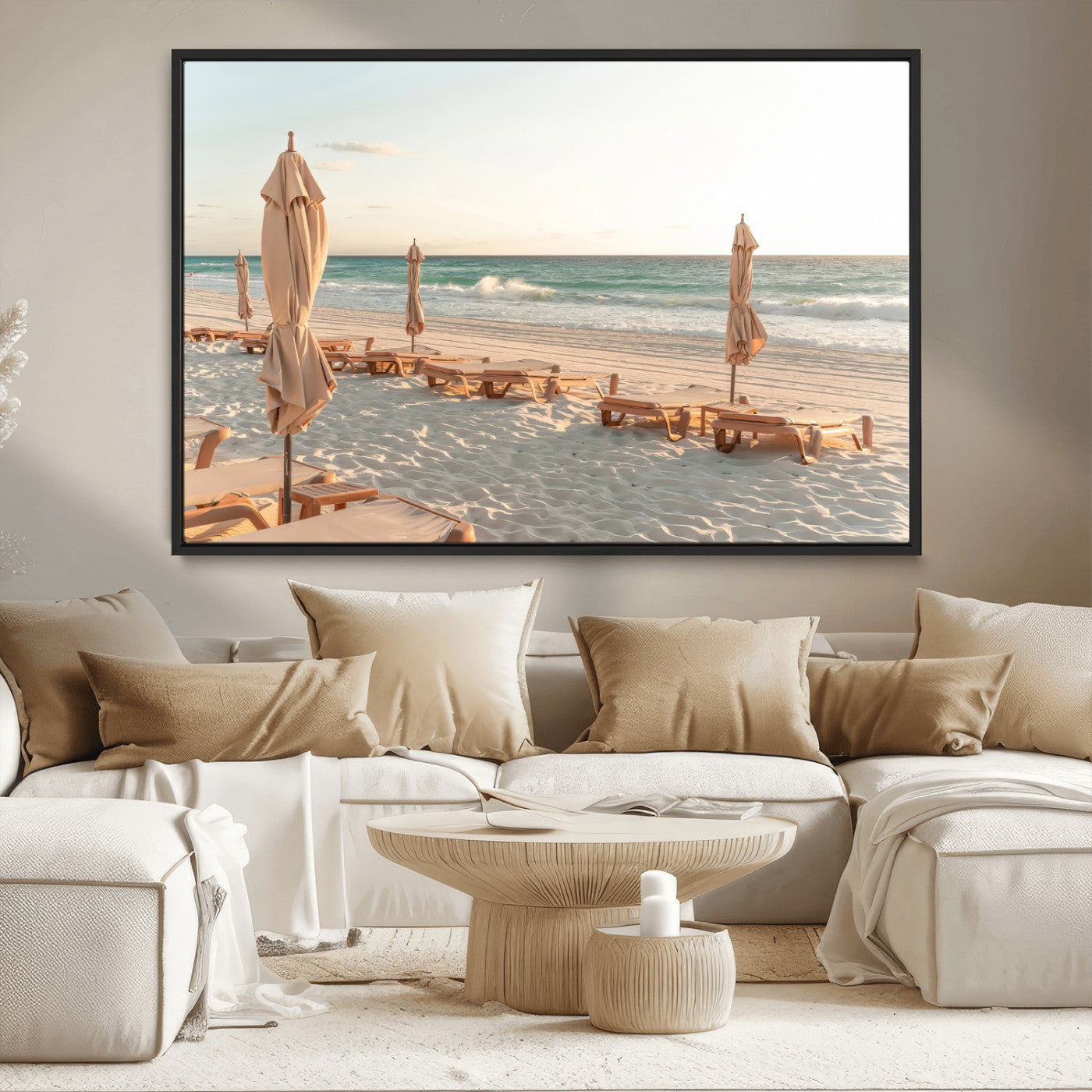 Minimalist photo of empty beach loungers and umbrellas on soft sand, ideal for calm seaside or pastel coastal-style home decor.
