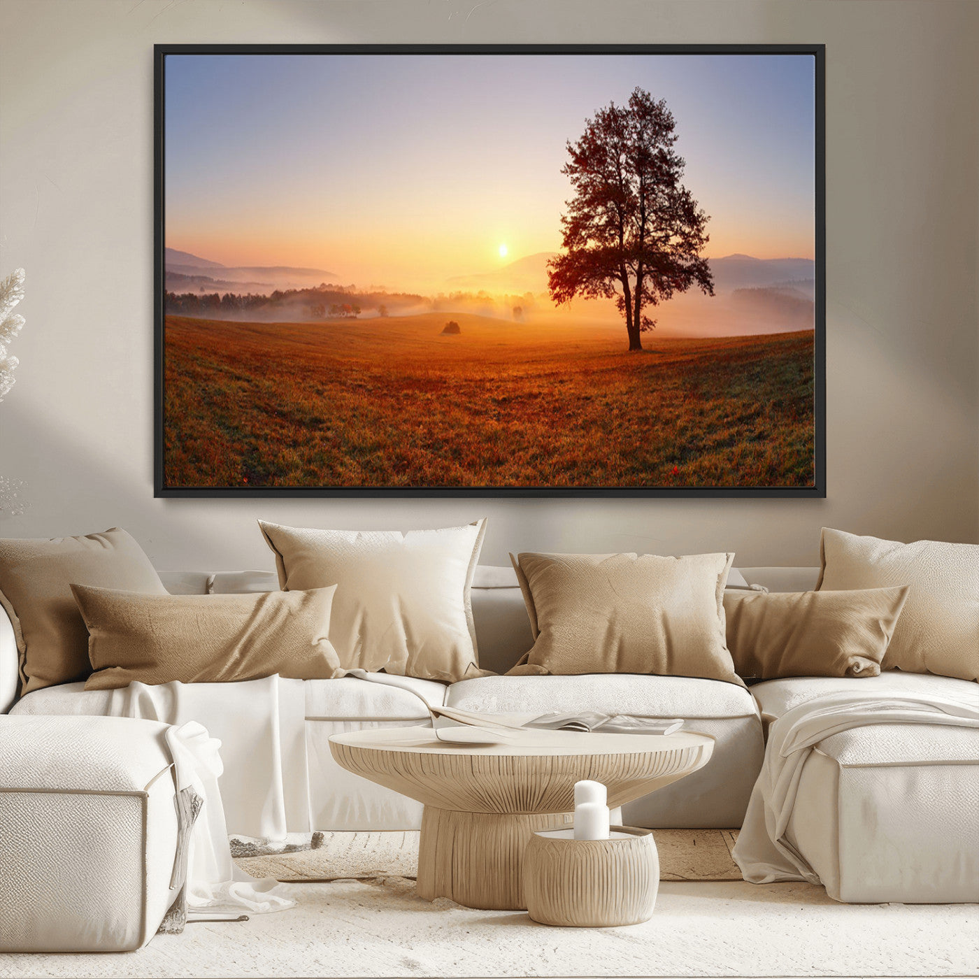 A tranquil landscape at sunrise with a mist-covered field and a lone tree, creating a peaceful and natural atmosphere.