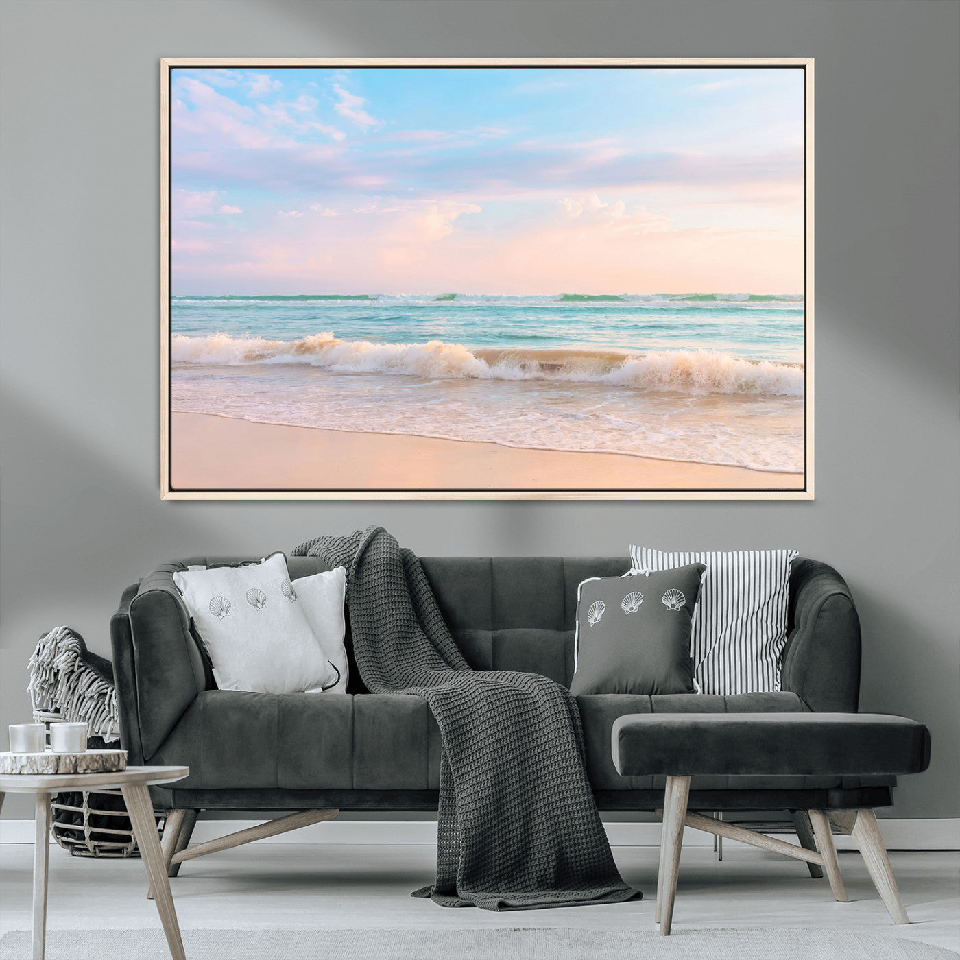 A peaceful beach scene with soft pastel skies, gentle waves washing up on the sandy shore, creating a calm and serene ocean view.