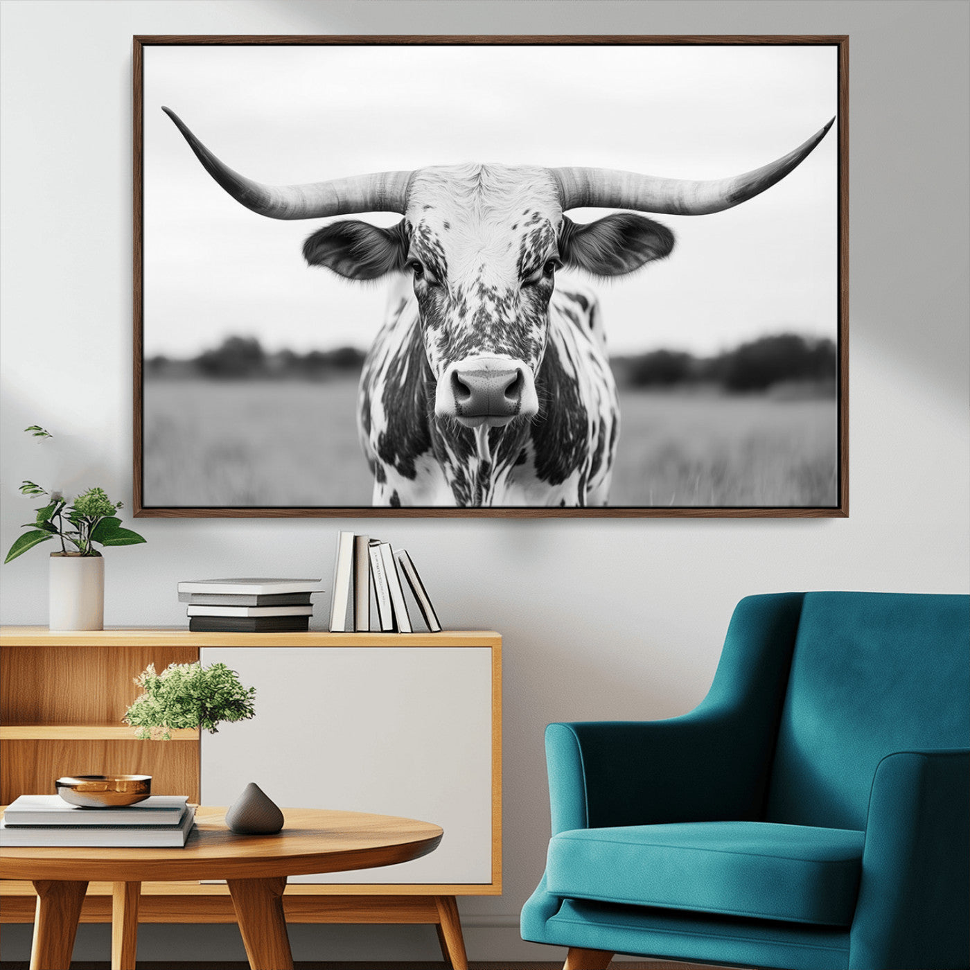 Capture the strength and elegance of nature with this striking black and white portrait of a longhorn cow. Its powerful presence makes a bold statement in any room.