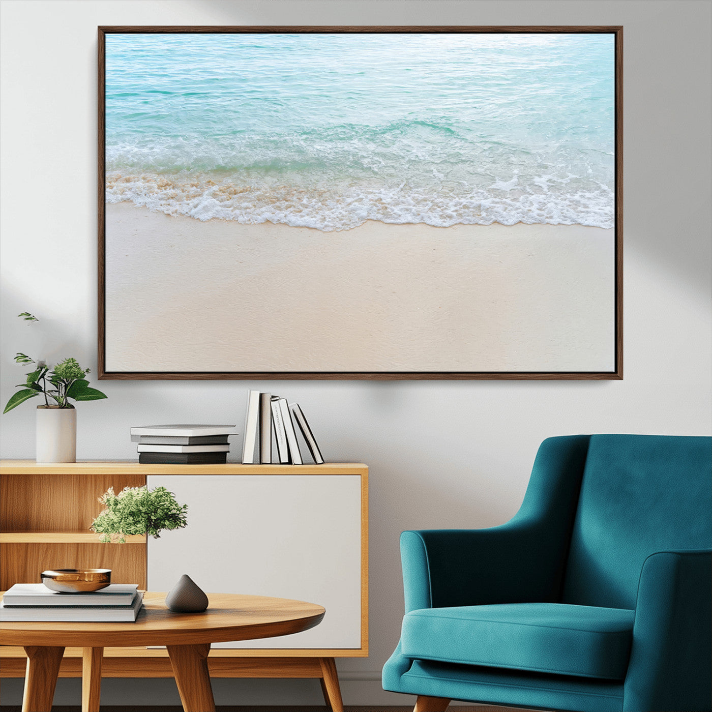 Soft shoreline with gentle aqua waves on smooth sand, ideal for minimalist coastal or pastel ocean-inspired home wall decor.