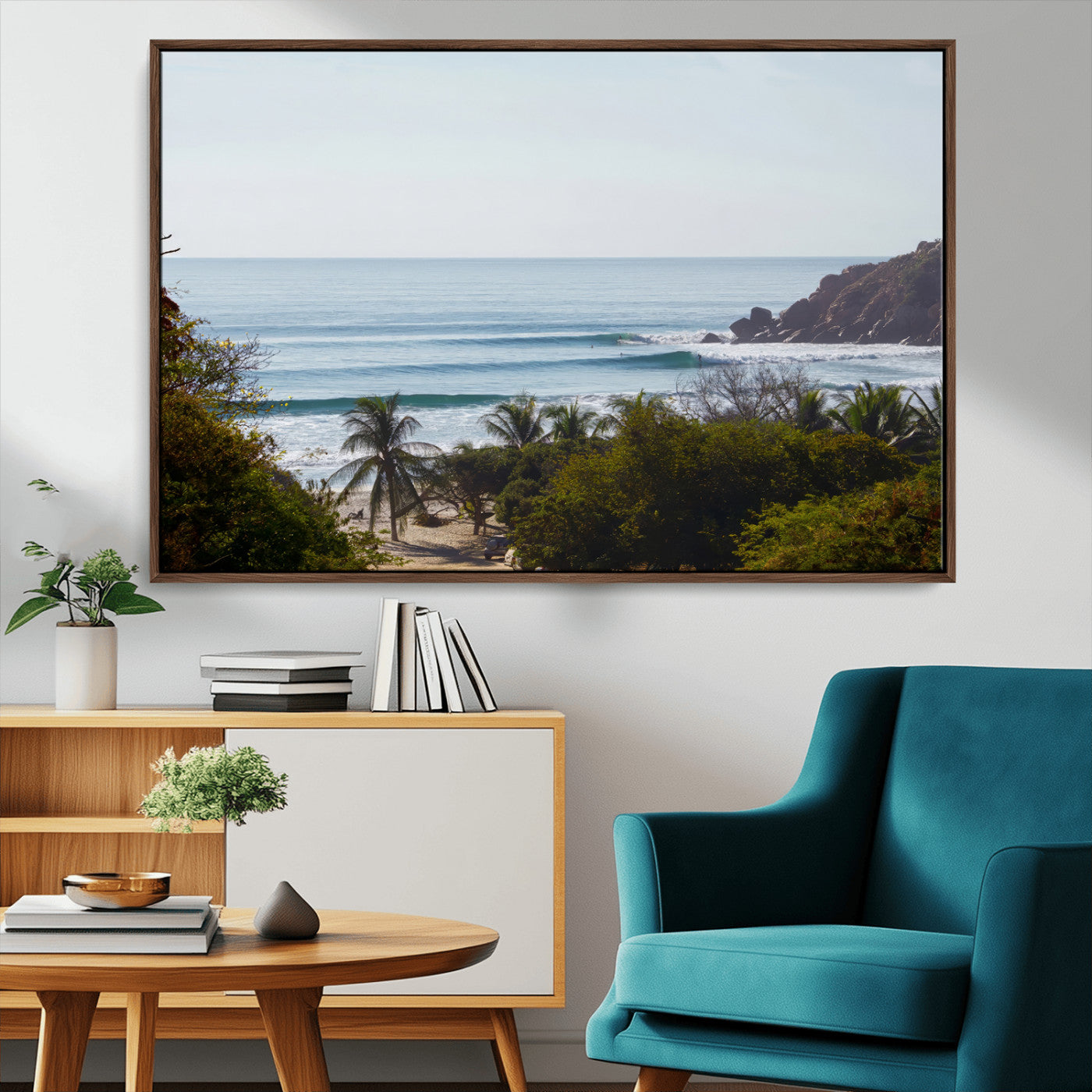 View of calm ocean waves with palm trees and a tropical coastline, ideal for coastal boho or beach-themed wall decor.
