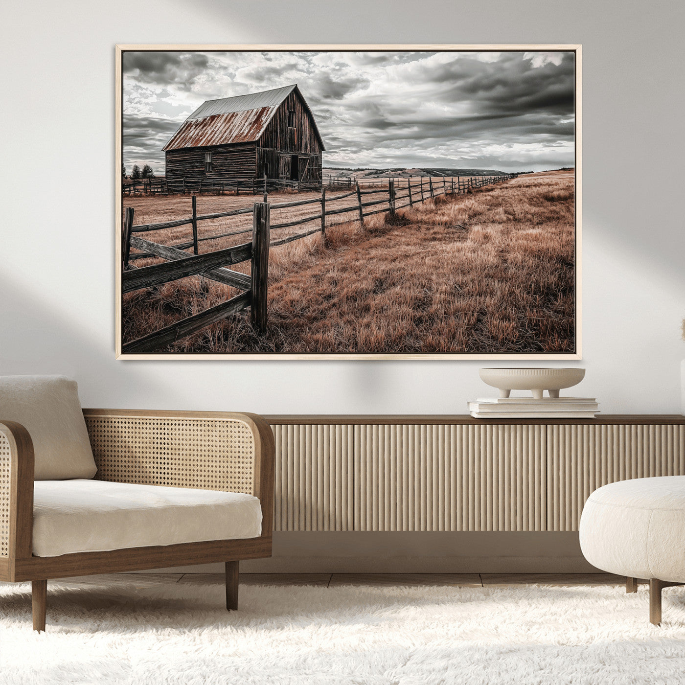 Framed canvas of a rustic barn under a moody sky with weathered fence and dark fields, ideal for farmhouse or rural-style wall decor.