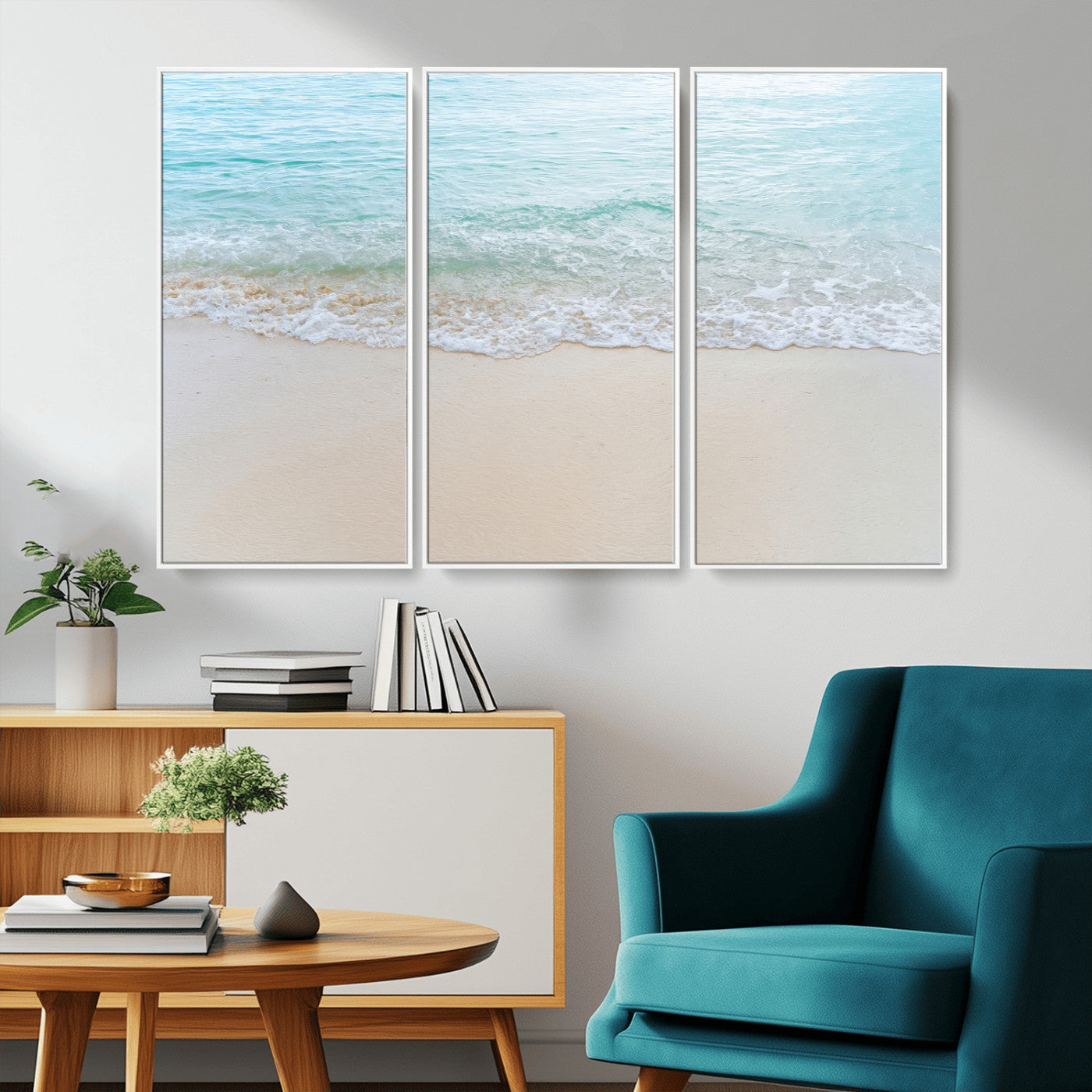 Soft shoreline with gentle aqua waves on smooth sand, ideal for minimalist coastal or pastel ocean-inspired home wall decor.