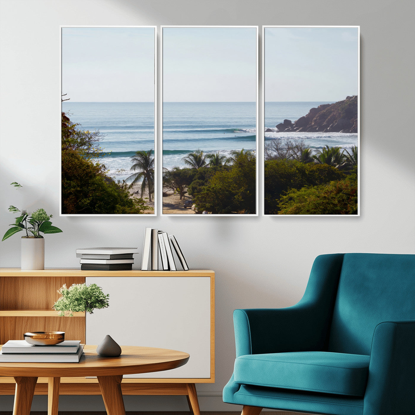 View of calm ocean waves with palm trees and a tropical coastline, ideal for coastal boho or beach-themed wall decor.