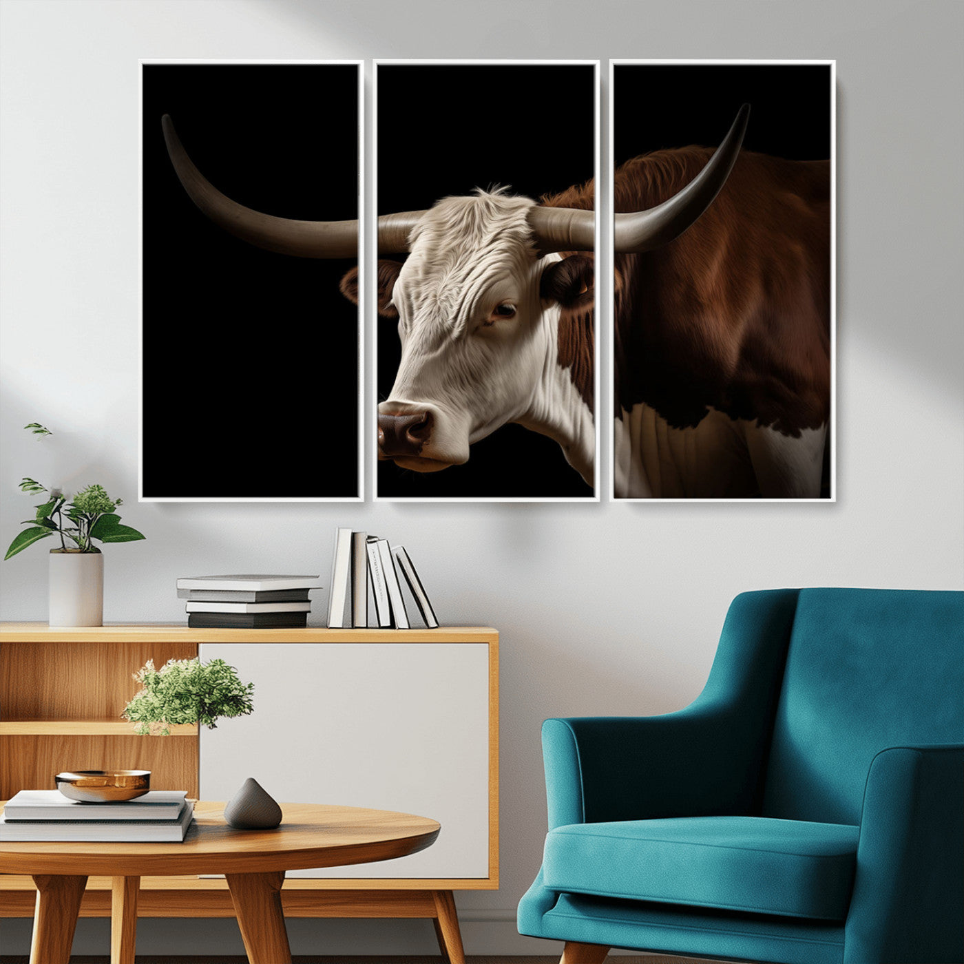 "Close-up of a brown and white longhorn cow with prominent curved horns against a black background."