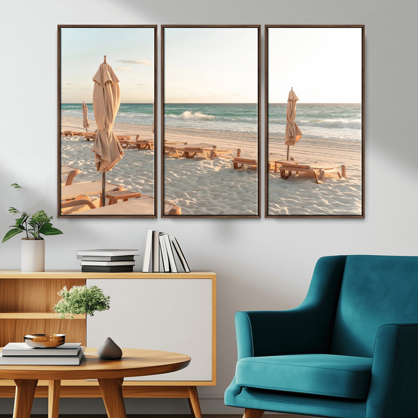Minimalist photo of empty beach loungers and umbrellas on soft sand, ideal for calm seaside or pastel coastal-style home decor.