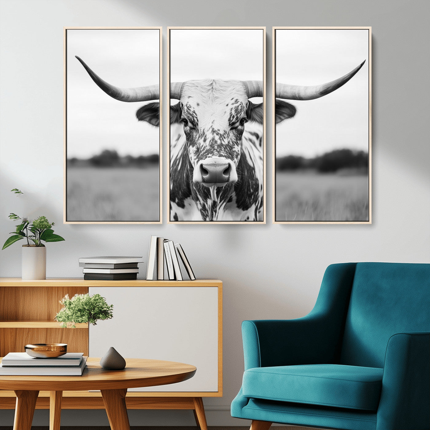 Capture the strength and elegance of nature with this striking black and white portrait of a longhorn cow. Its powerful presence makes a bold statement in any room.